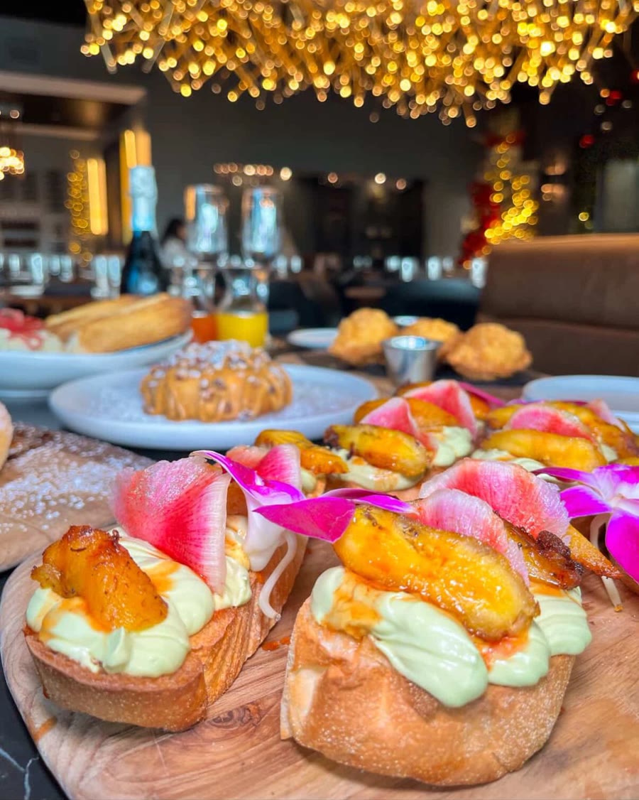 Avocado bruschetta with fried sweet plantain and watermelon radish at brunch
